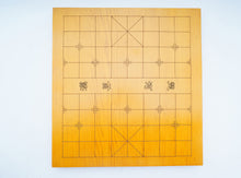 Load image into Gallery viewer, SongYun Double-sided Kaya Wood Jointed and Carved 1.18 inch board: 19x19 Go Game Board, Chinese chess on the reverse