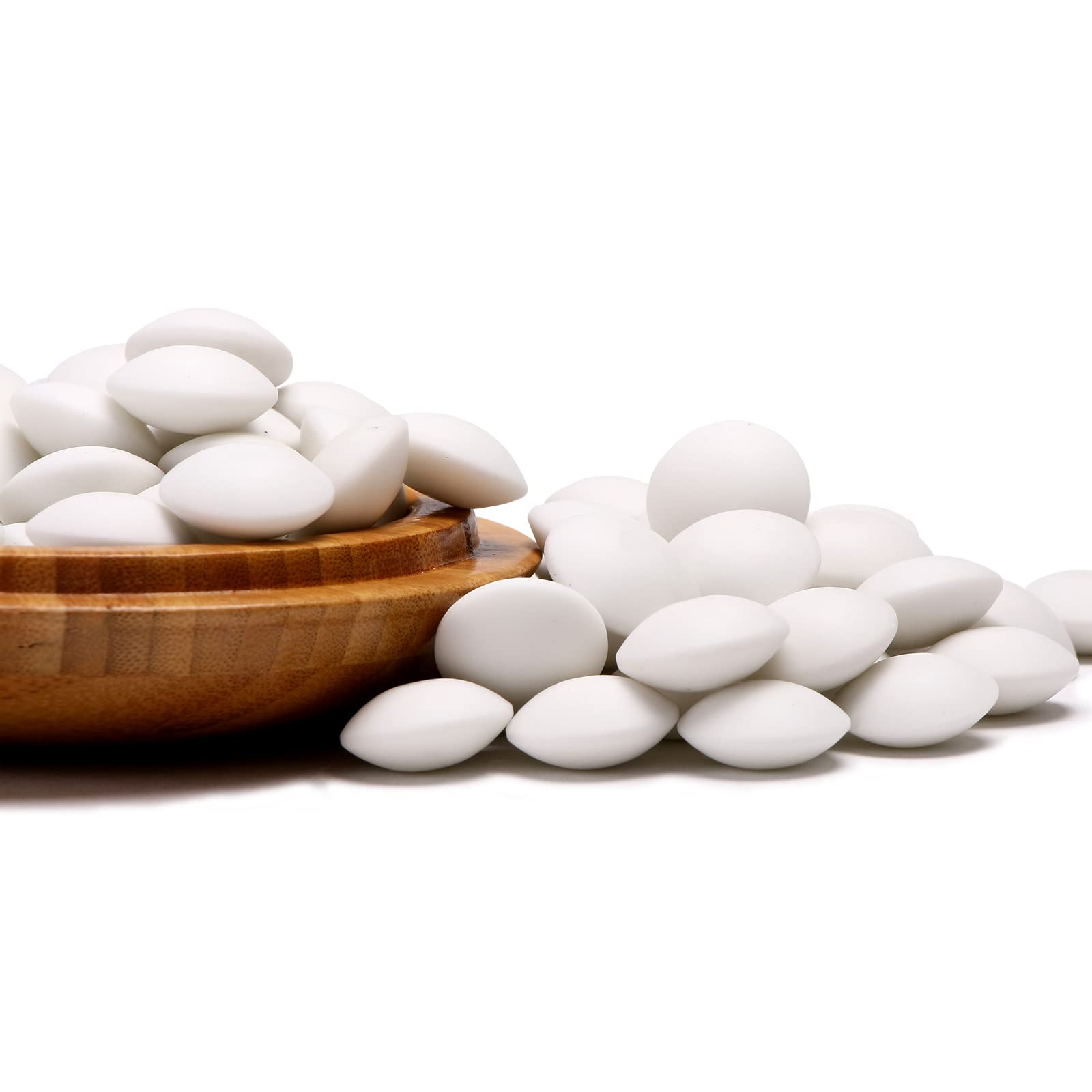 White Go Double Convex Yunzi Stones In Wooden Bowl Stock Image - Image...